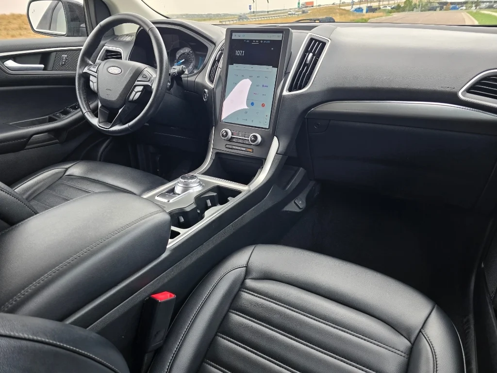Used 2022 Agate Black Metallic Ford SEL image 26