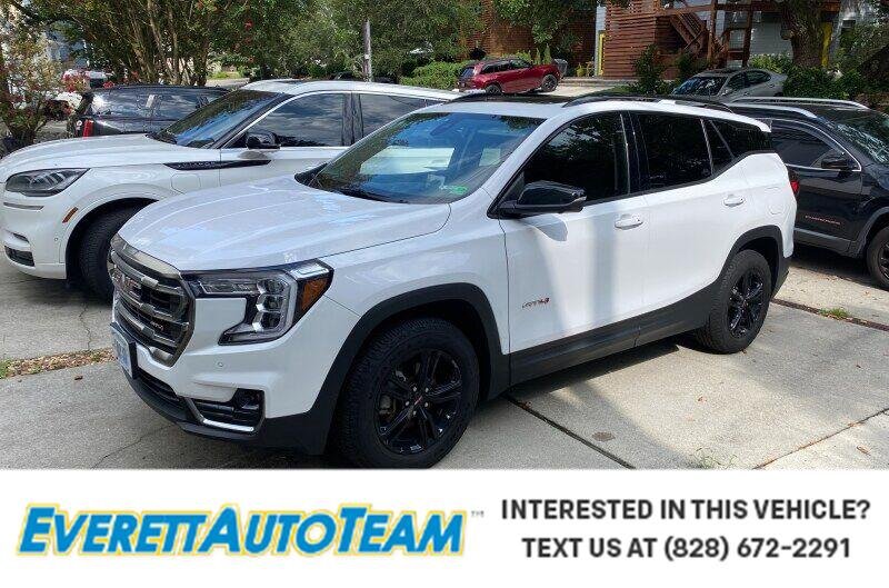 Used 2023 SUMMIT WHITE GMC AT4 image 1