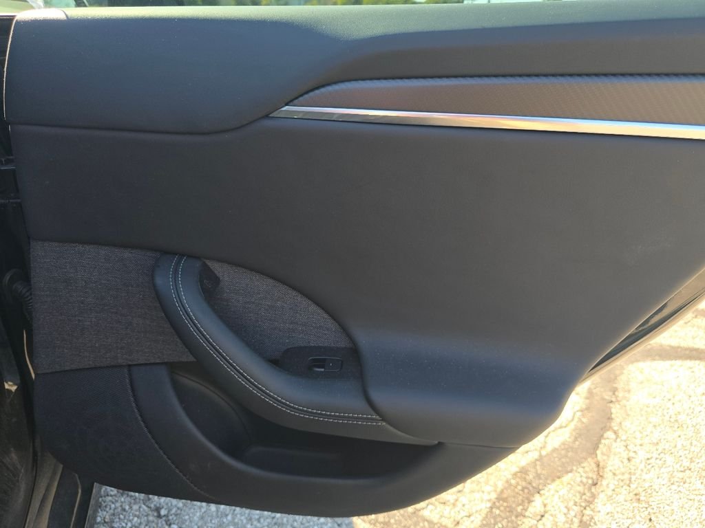 Used 2024 Solid Black Tesla Plaid image 17