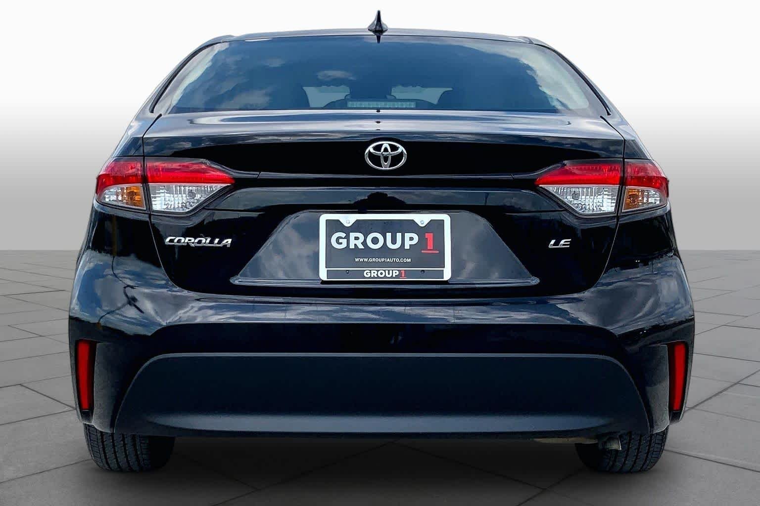 Used 2024 Midnight Black Metallic Toyota LE image 5