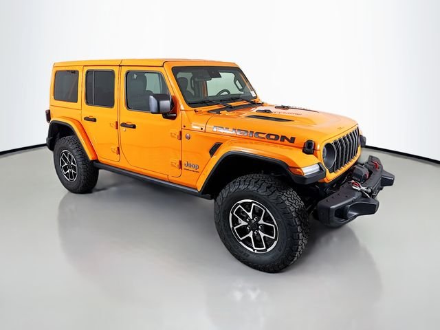 Used 2025 Orange Jeep Rubicon image 1