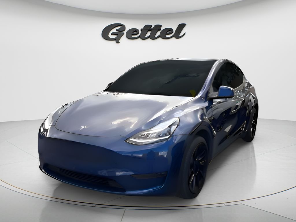Used 2023 Tesla Model Y Long Range with VIN 7SAYGDEE0PA052105 for sale in Bradenton, FL