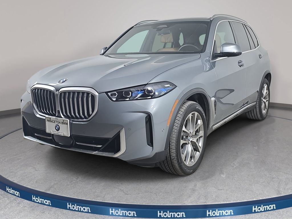 Used 2026 Skyscraper Grey Metallic BMW xDrive40i image 1