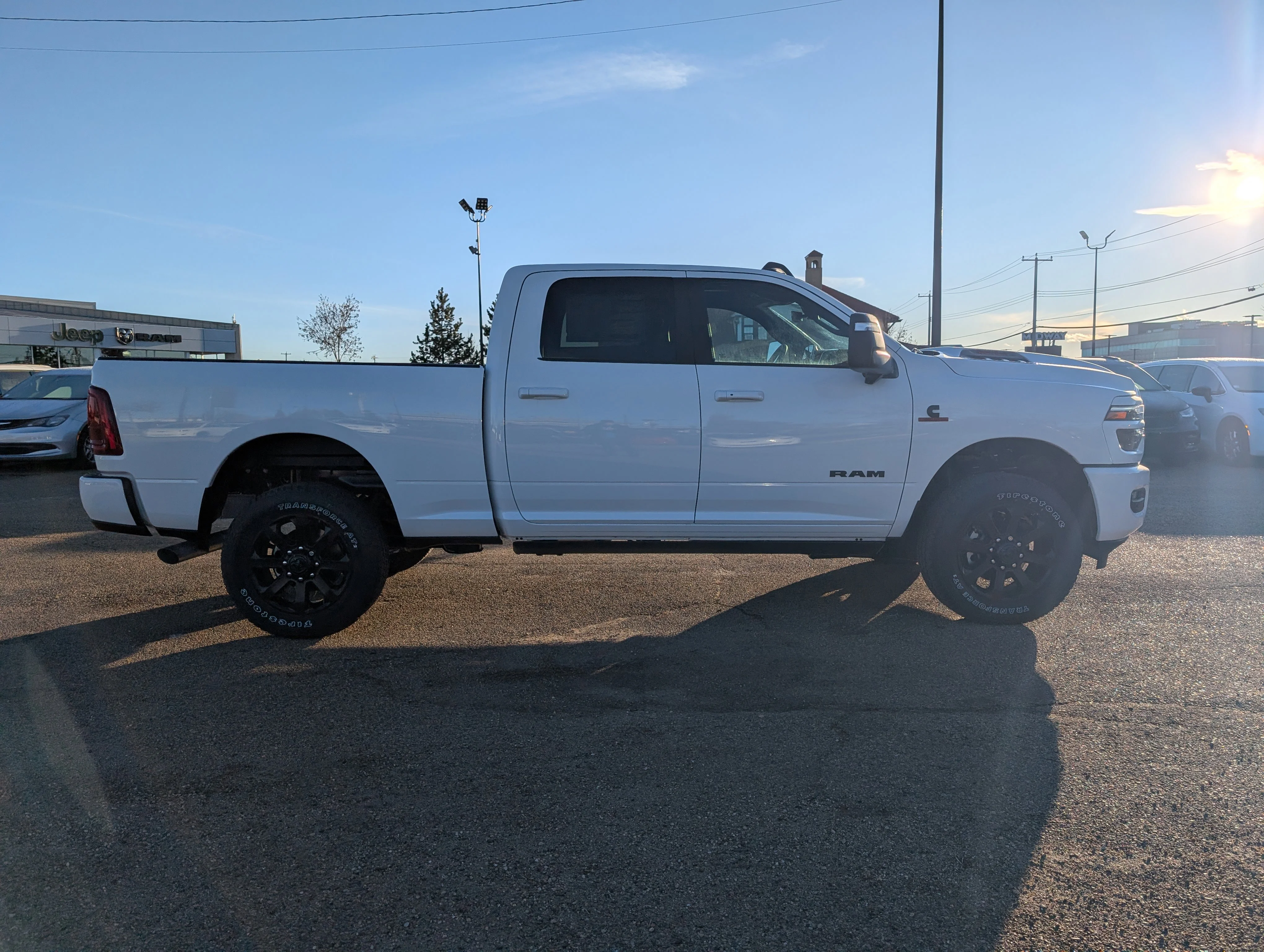 New 2026 Bright White Ram Laramie image 8