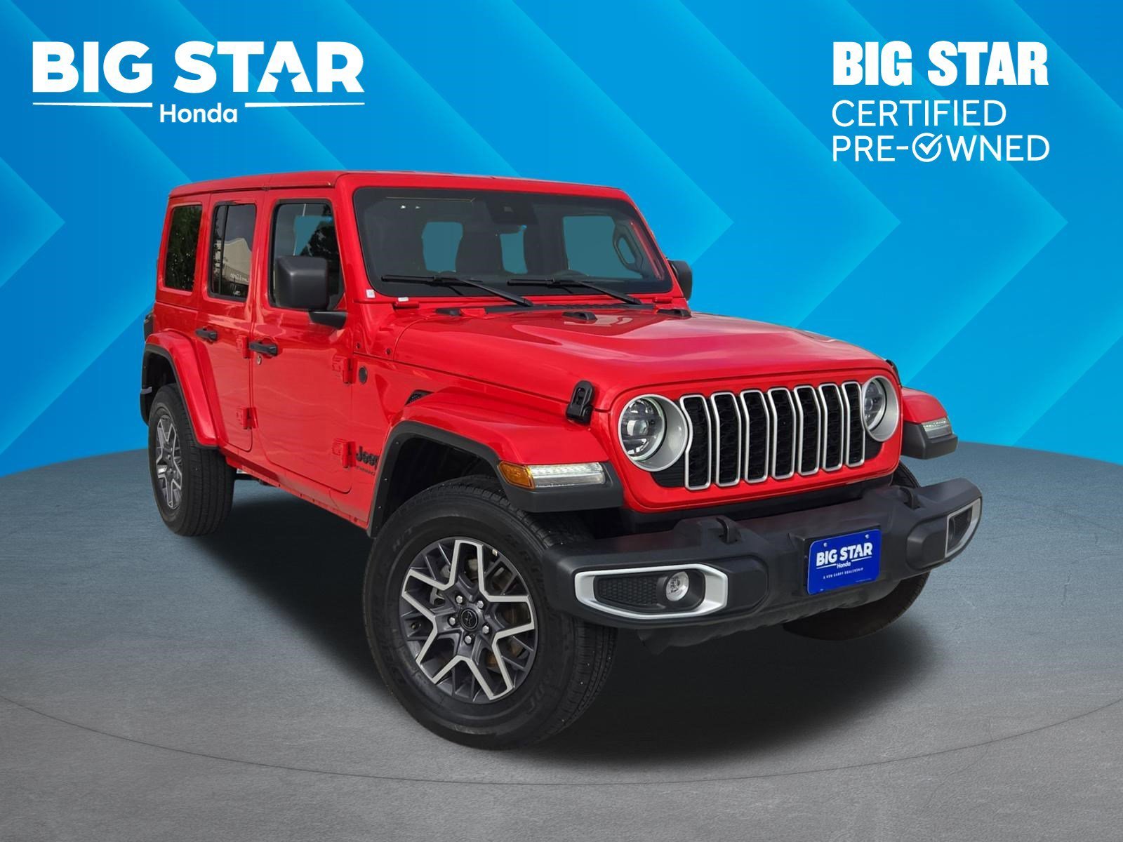 Used 2025 Firecracker Red Clearcoat Jeep Sahara image 1