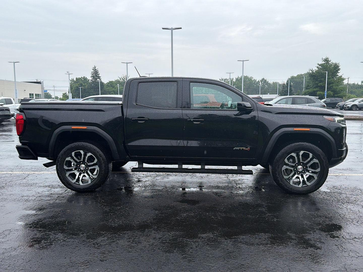 Used 2024 Onyx Black GMC 4WD AT4 image 4
