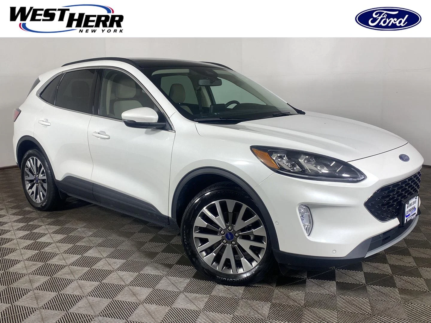 Used 2020 Star White Metallic Tri-Coat Ford Titanium image 1