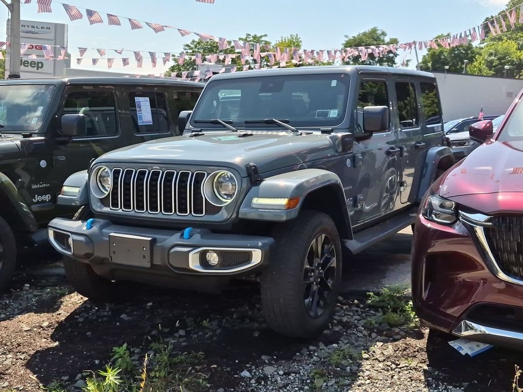 Used 2024 Gray Jeep Sahara 4xe image 1
