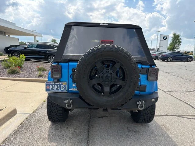 Used 2016 Blue Jeep Unlimited Sahara image 7