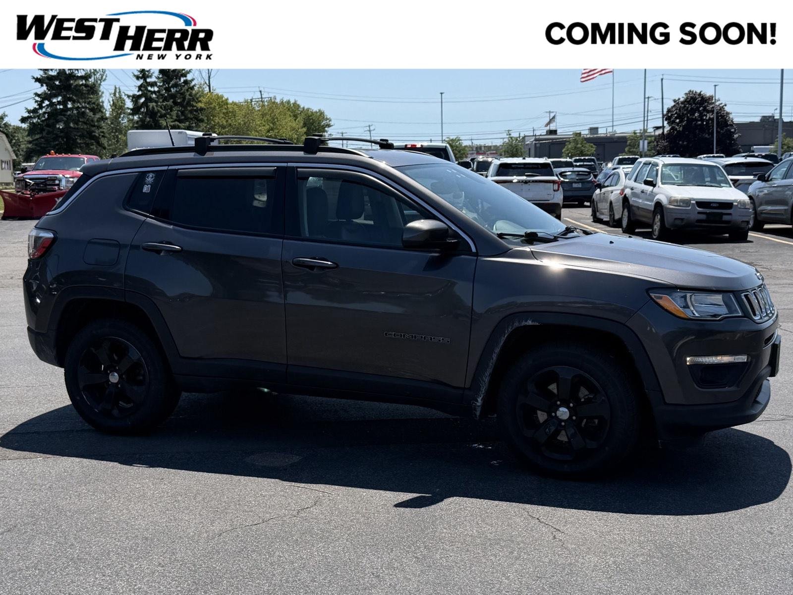 Used 2019 Granite Crystal Metallic Clearcoat Jeep Latitude image 1