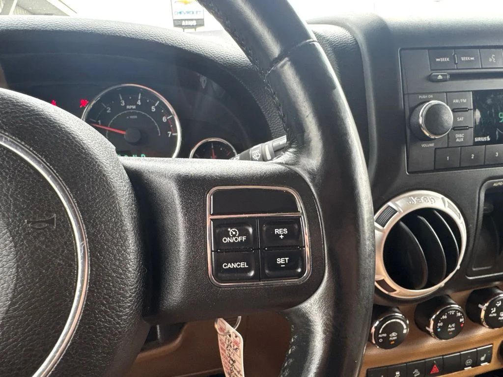 Used 2011 Orange Jeep Rubicon image 27