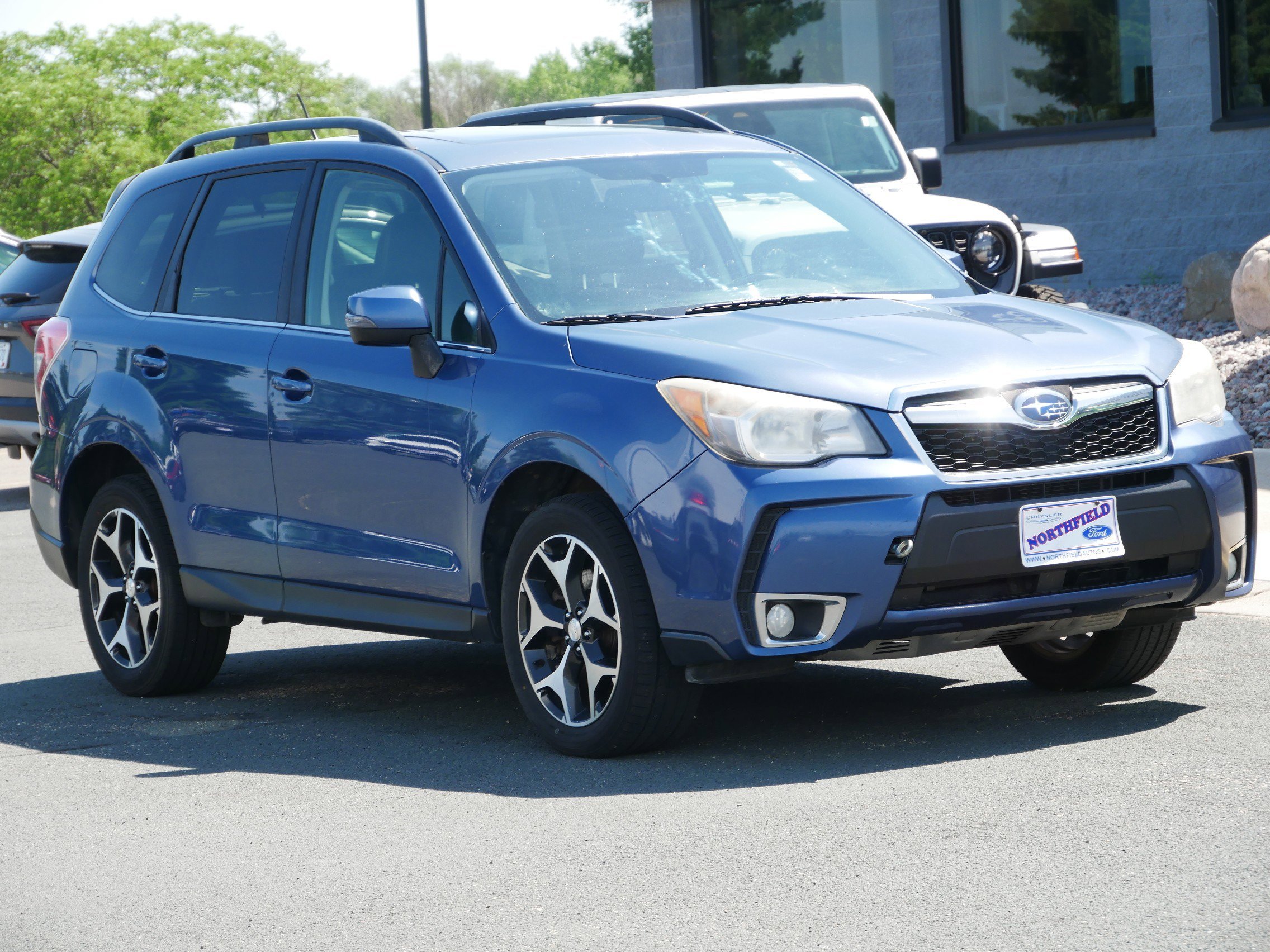 Used 2014 Subaru Forester XT Touring with VIN JF2SJGMC0EH546293 for sale in Northfield, Minnesota