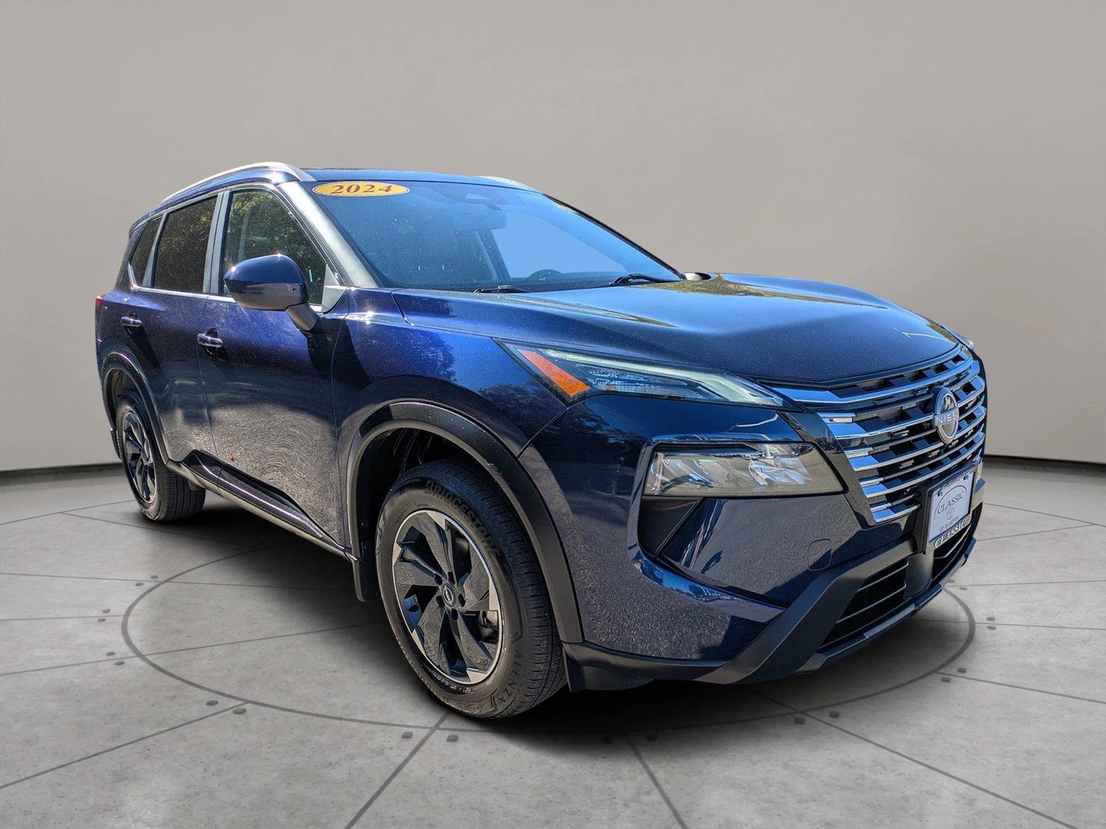 Used 2024 Deep Ocean Blue Pearl Nissan SV image 1