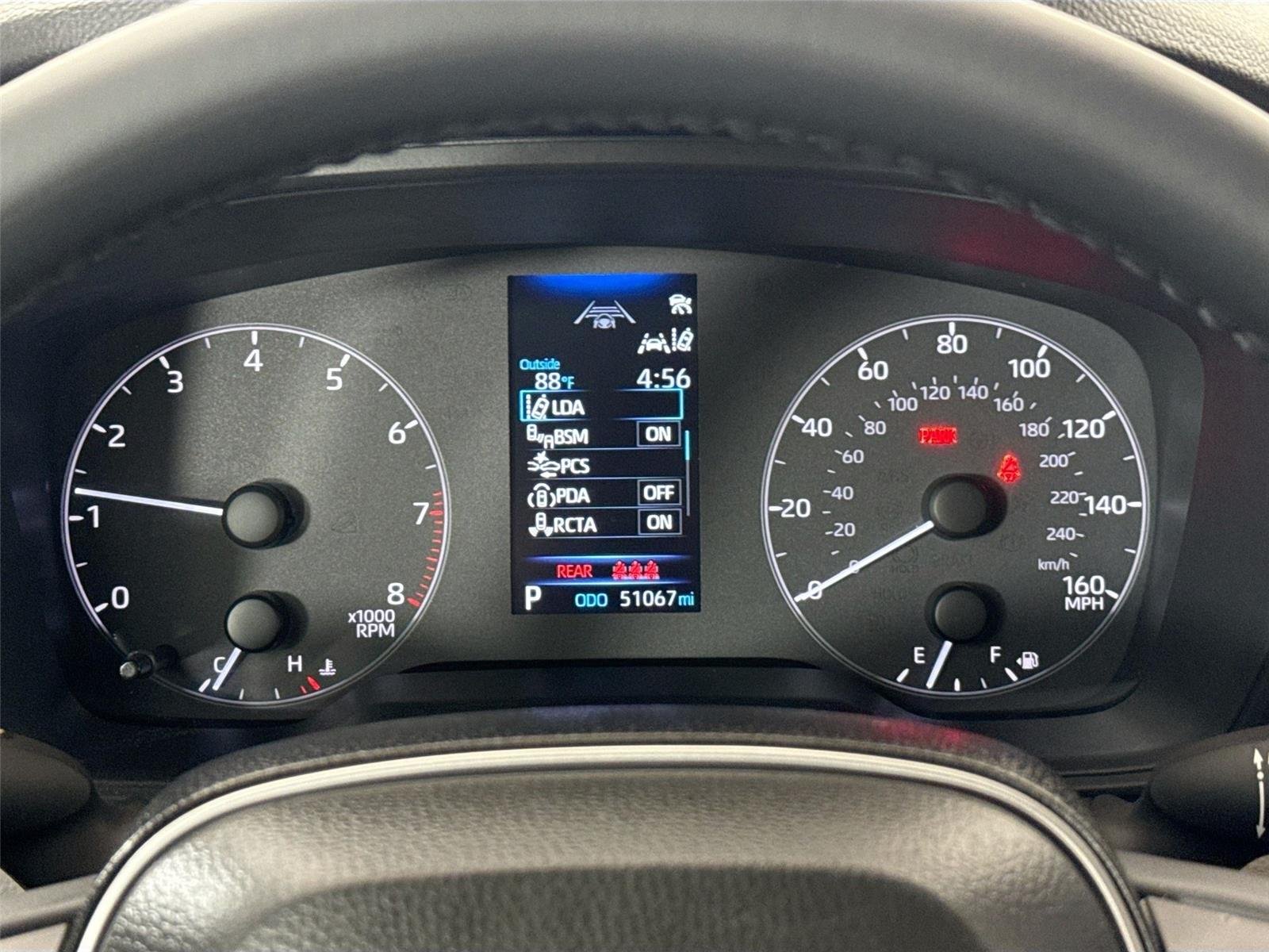 Used 2024 Barcelona Red Metallic Toyota LE image 19