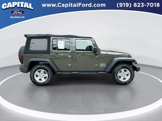 Used 2015 Green Jeep Unlimited Sport image 9
