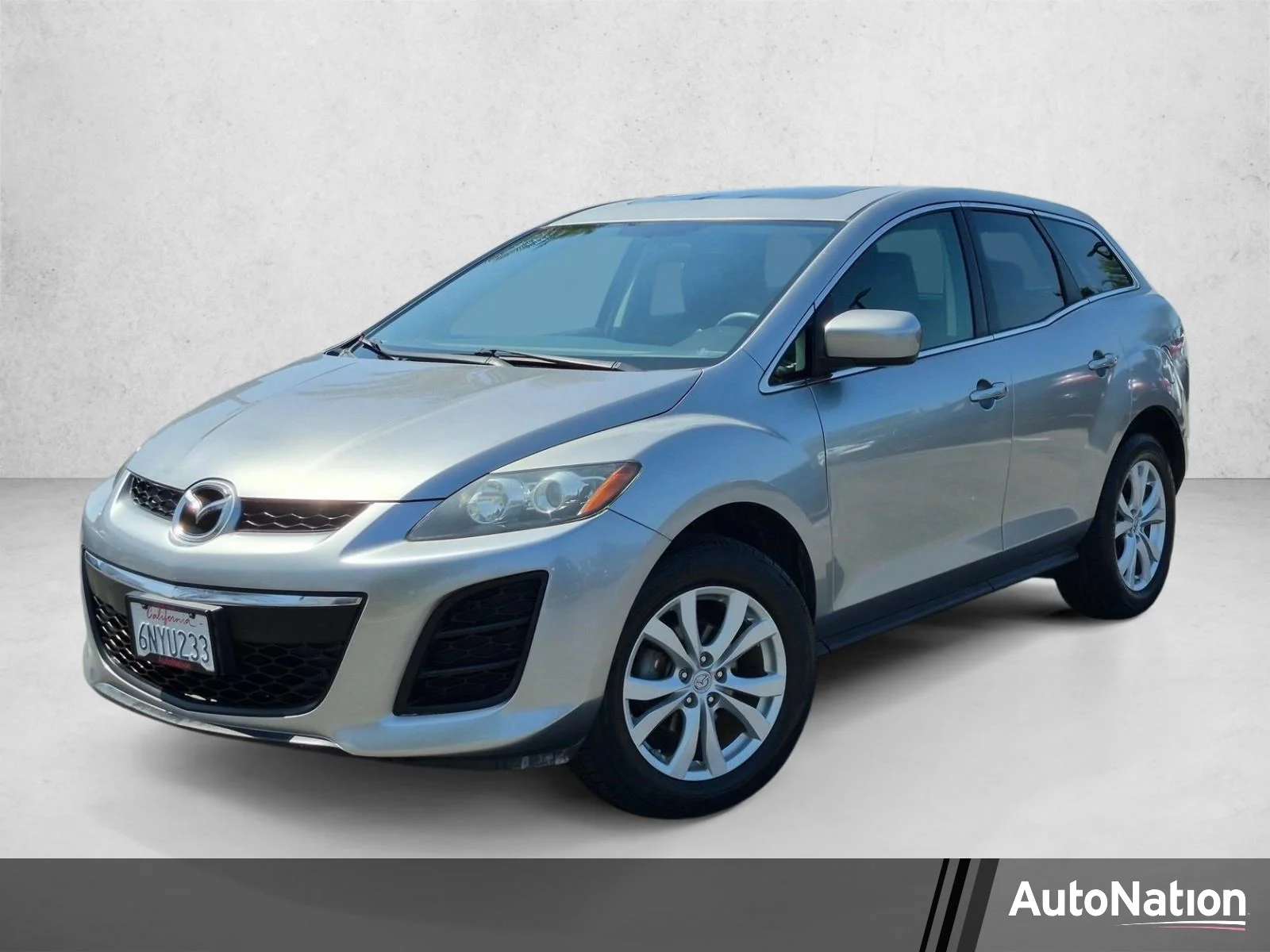 Used 2010 Liquid Silver Metallic Mazda Touring image 1