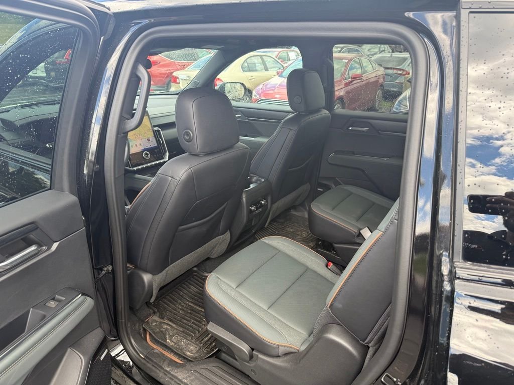 Used 2024 Ebony Twilight Metallic GMC AT4 image 6