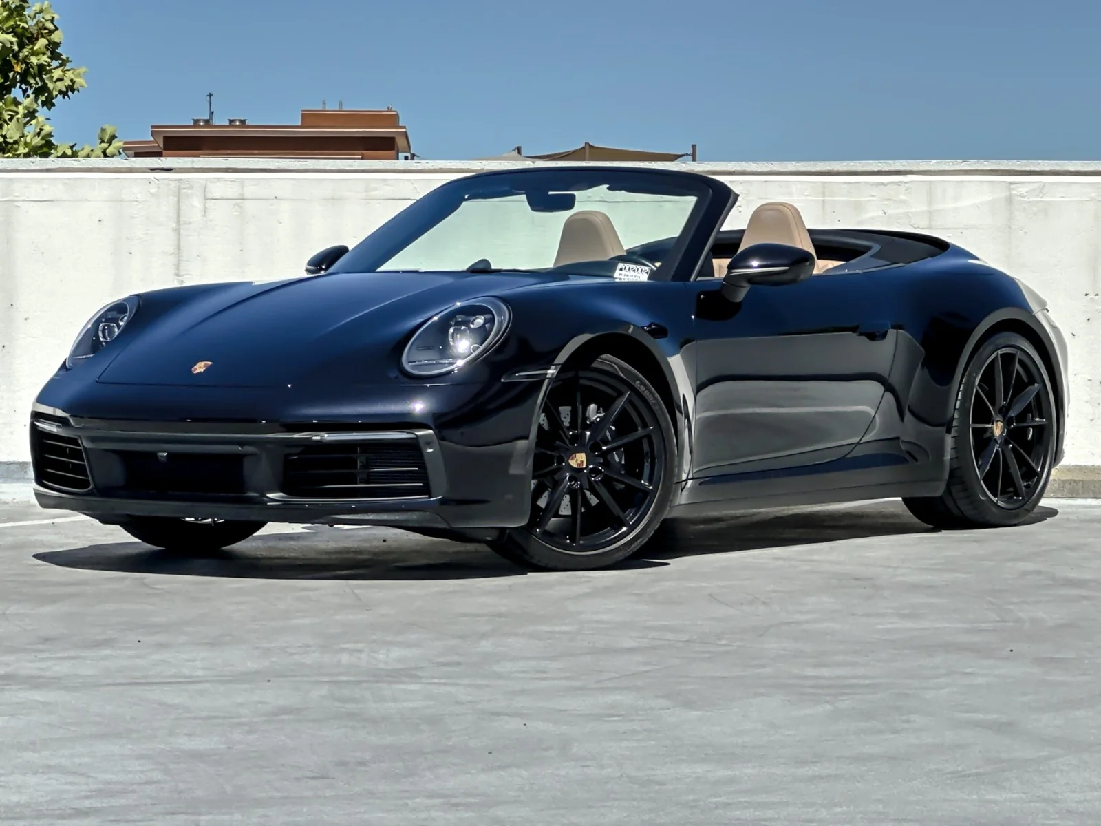 Used 2023 Jet Black Metallic Porsche Carrera Cabriolet image 1
