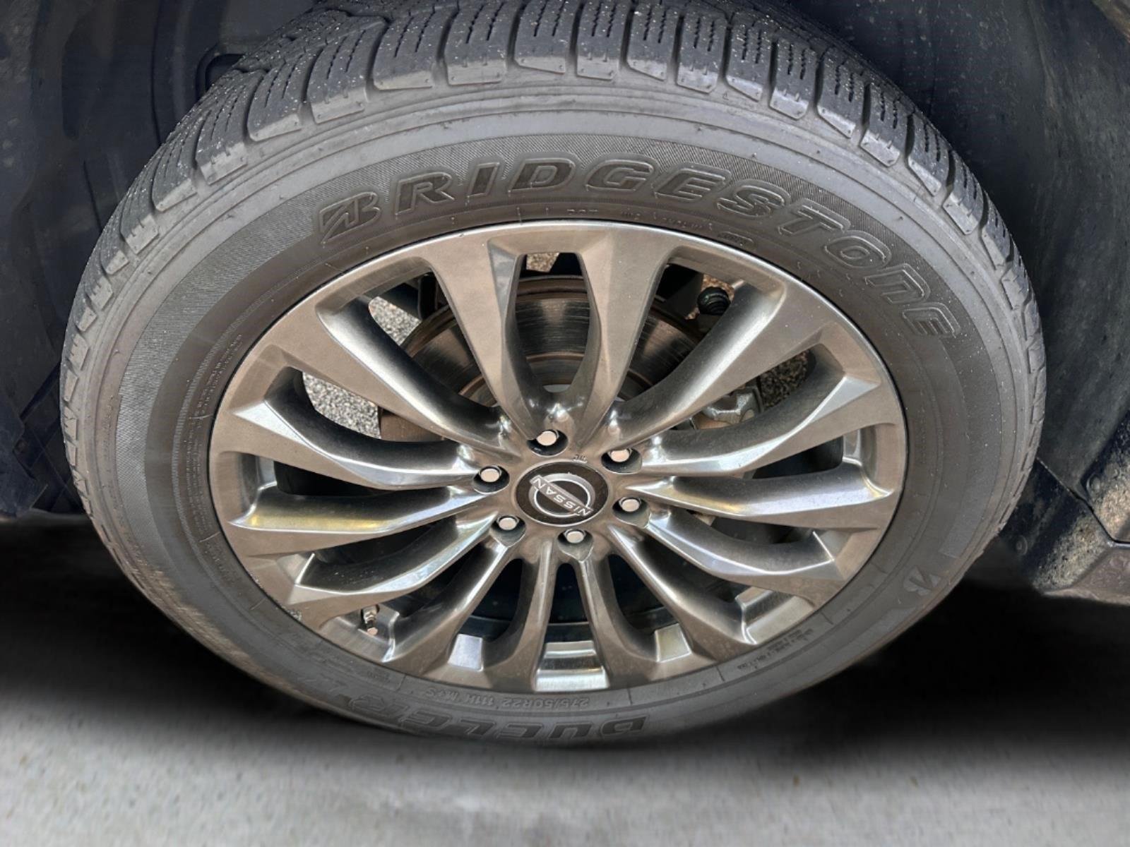 Used 2021 Super Black Nissan Platinum image 21