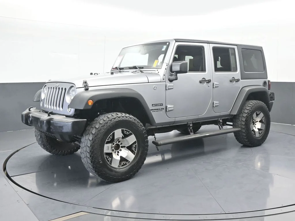 Used 2016 Billet Silver Metallic Clearcoat Jeep Unlimited Sport image 6