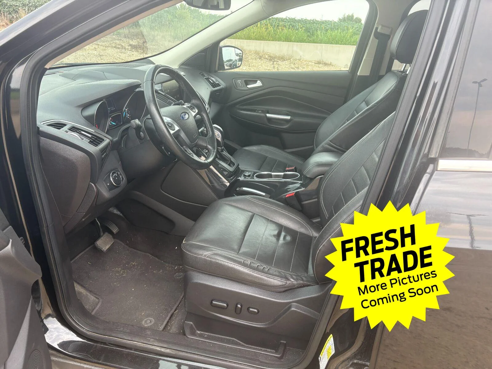 Used 2014 Tuxedo Black Metallic Ford Titanium image 9
