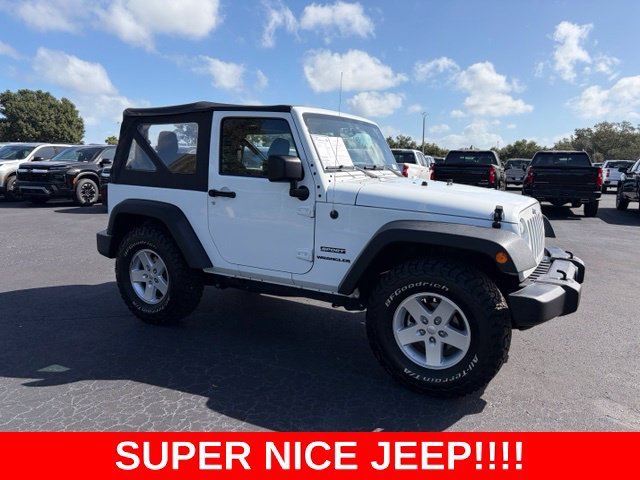 Used 2017 Bright White Clea Jeep Sport image 1