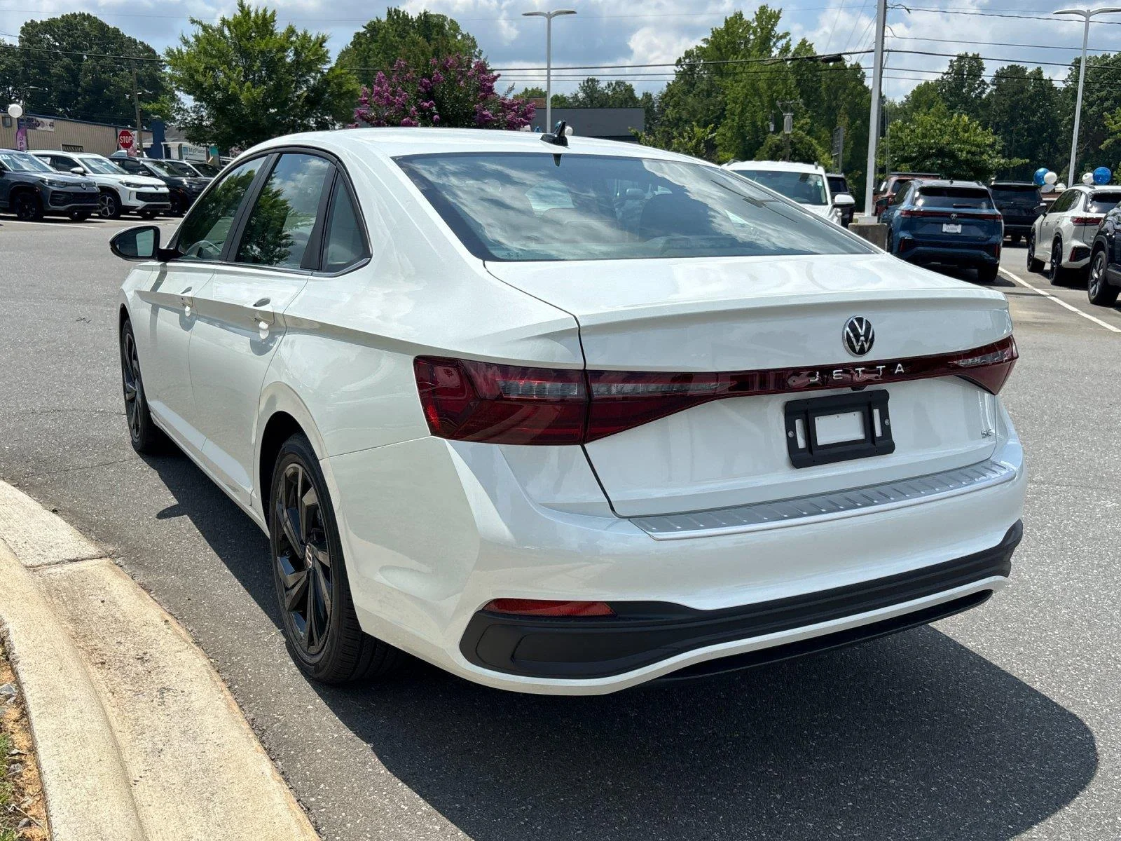 New 2026 Opal White Pearl Volkswagen SE image 3