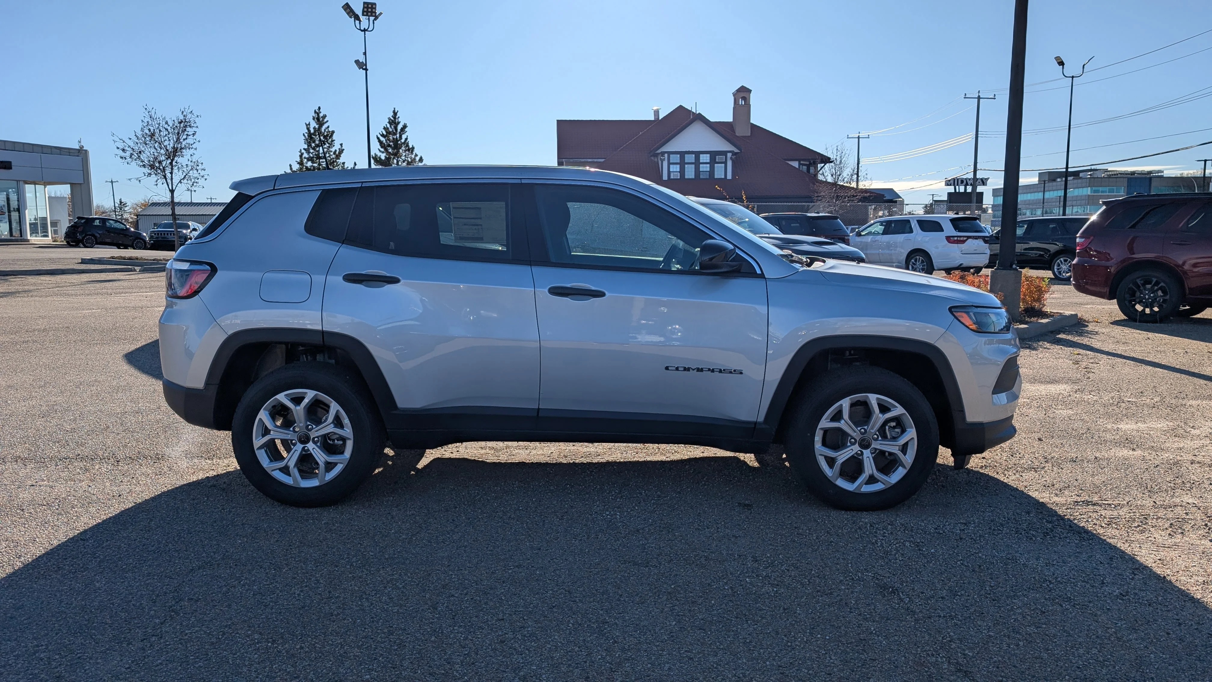 New 2026 Silver Zynith Metallic Jeep Sport image 8