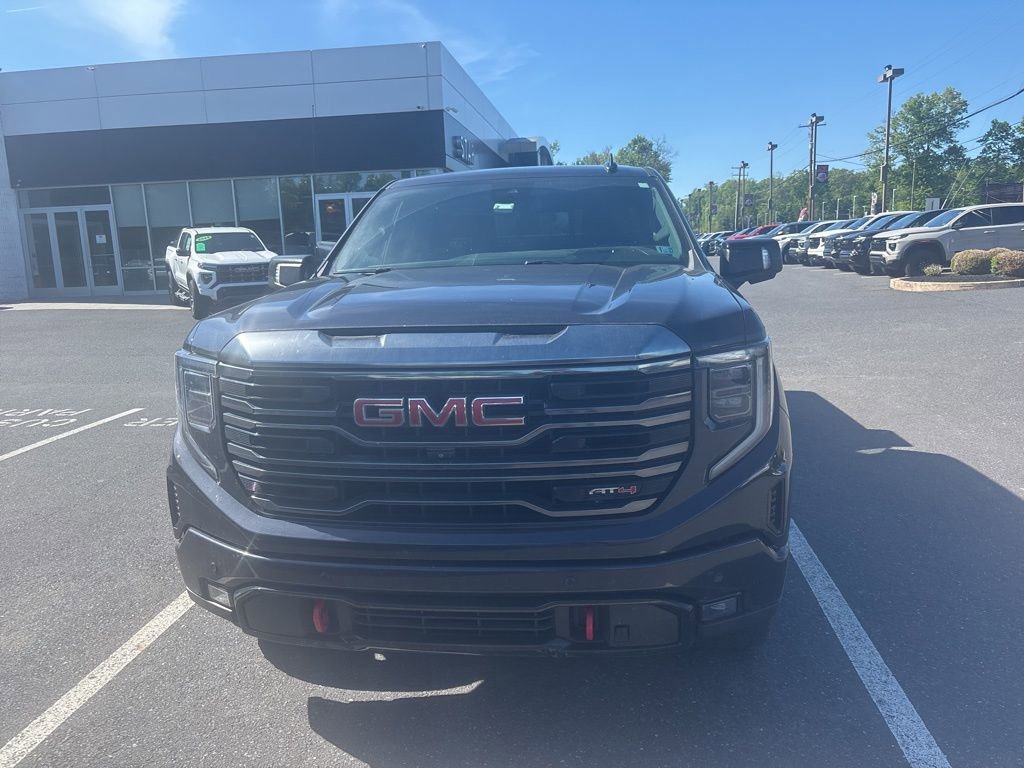 Used 2023 Titanium Rush Metallic GMC AT4 image 6