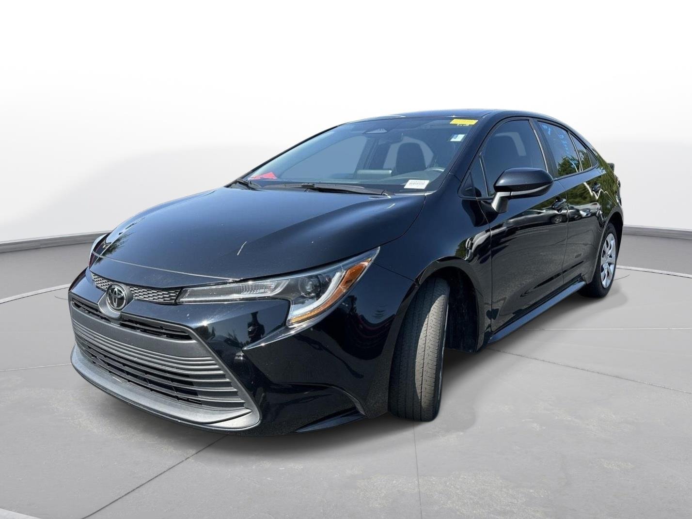 Used 2024 Midnight Black Metallic Toyota LE image 2