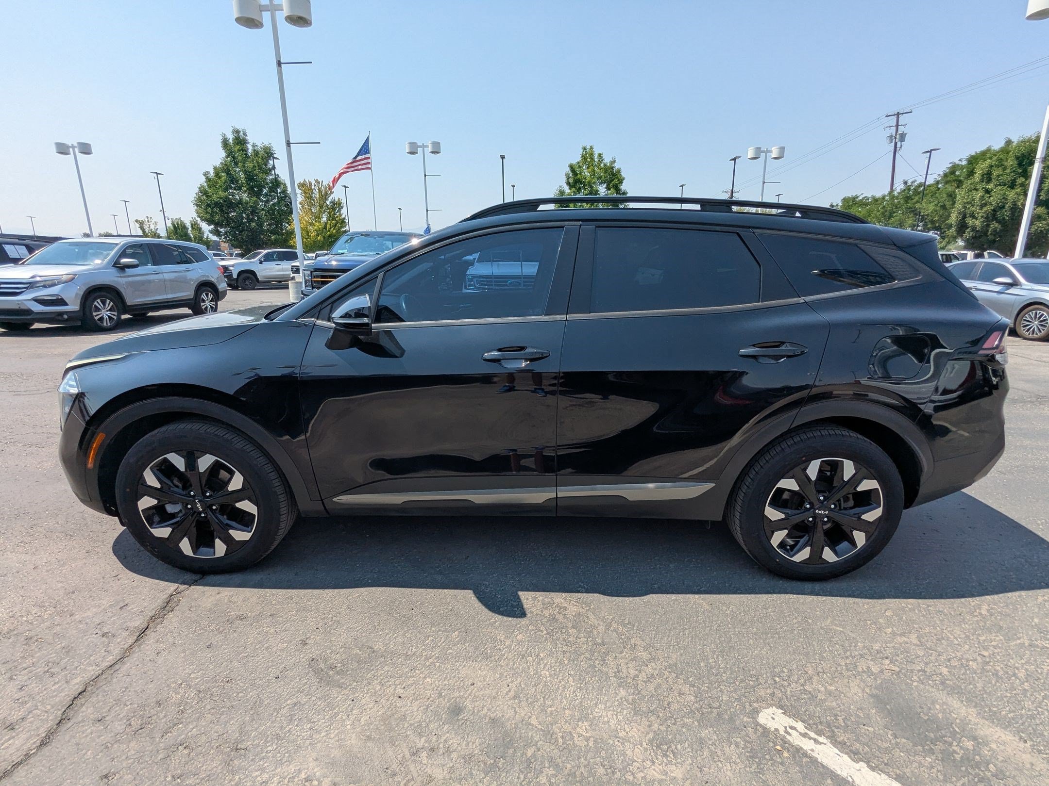 Used 2023 Ebony Black Kia X-Line image 7