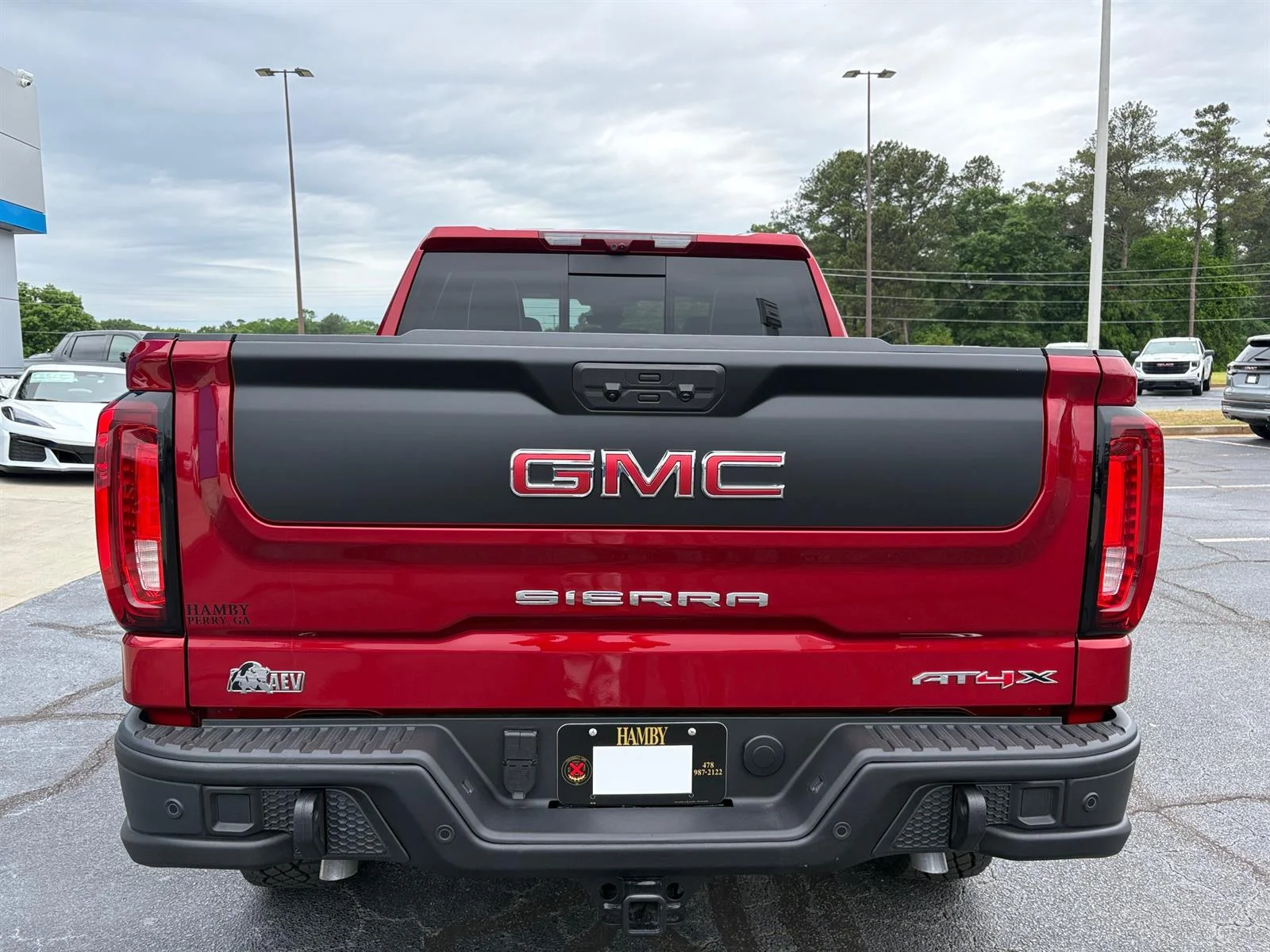 Used 2026 Volcanic Red Tintcoat GMC AT4X image 8