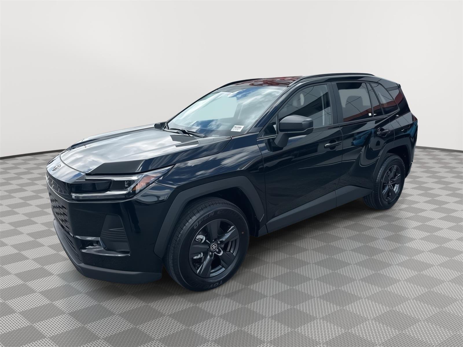 Used 2026 Midnight Black Metallic Toyota LE image 1