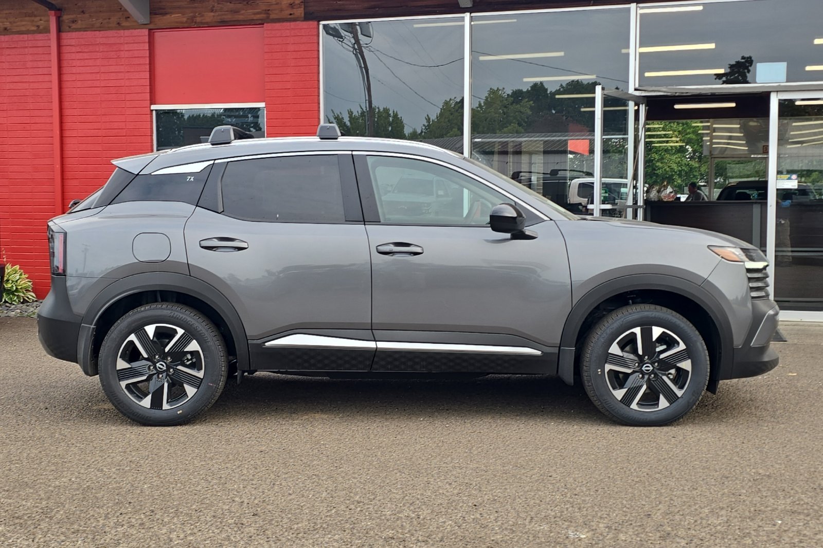 New 2026 Gun Metallic Nissan SV image 3