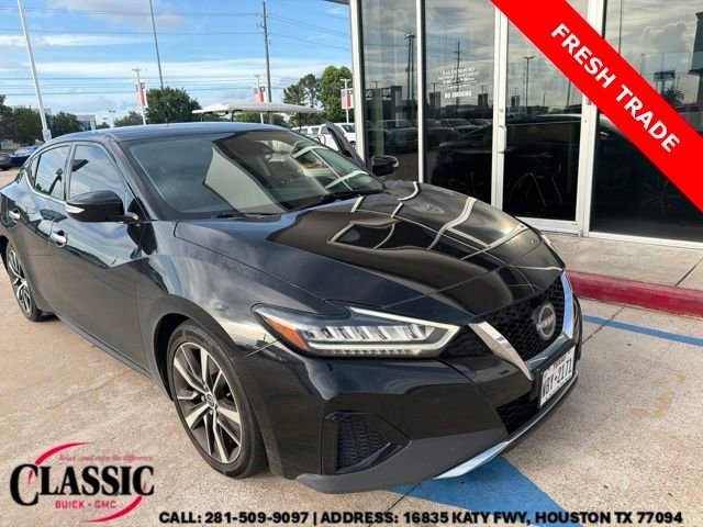 Used 2023 Black Nissan SV Xtronic CVT image 1