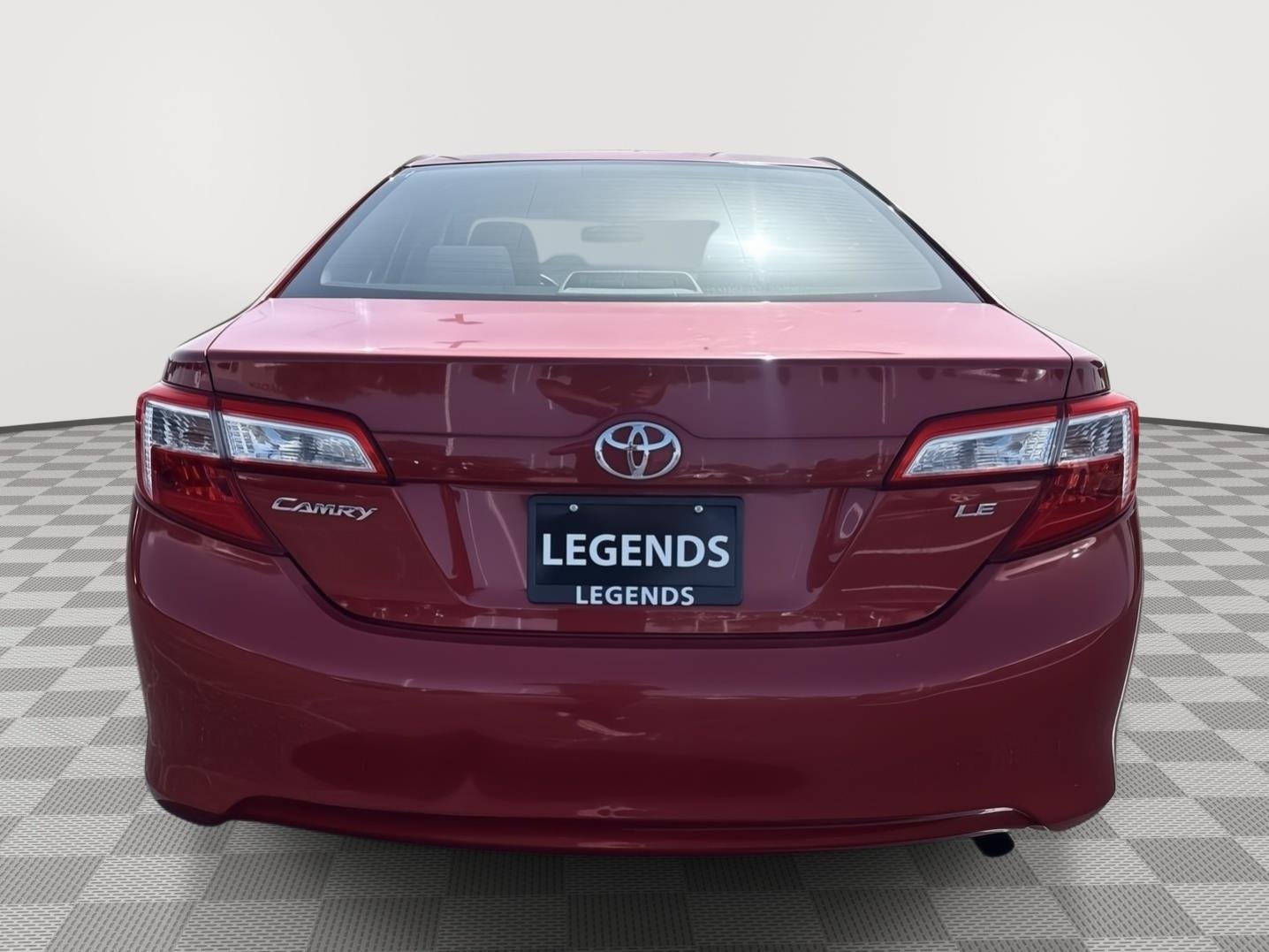 Used 2013 Barcelona Red Metallic Toyota LE image 4
