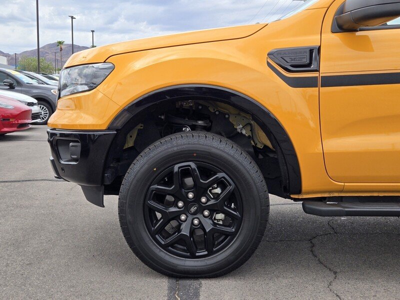 Used 2022 Orange Metallic FORD XLT 4WD SUPERCREW 5