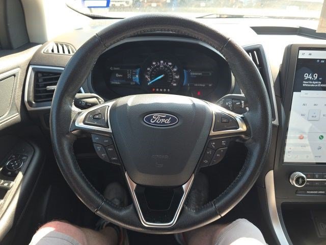 Used 2024 Agate Black Metallic Ford SEL image 16