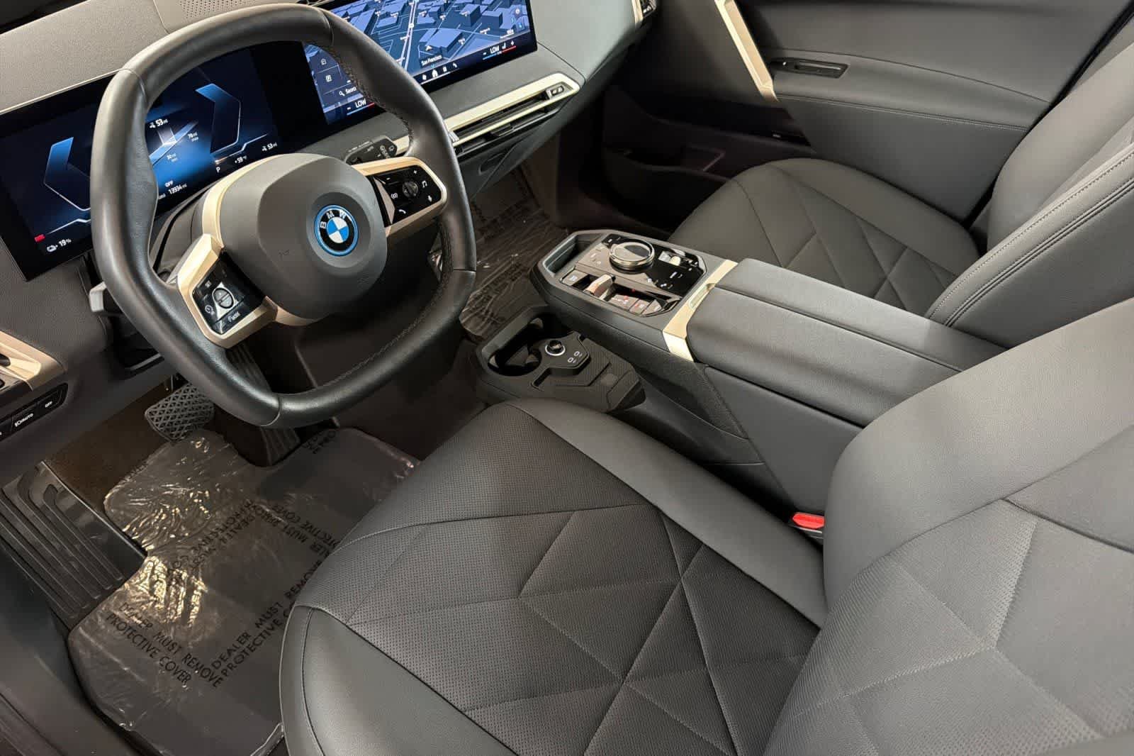 Used 2024 Black Sapphire Metallic BMW xDrive50 image 11