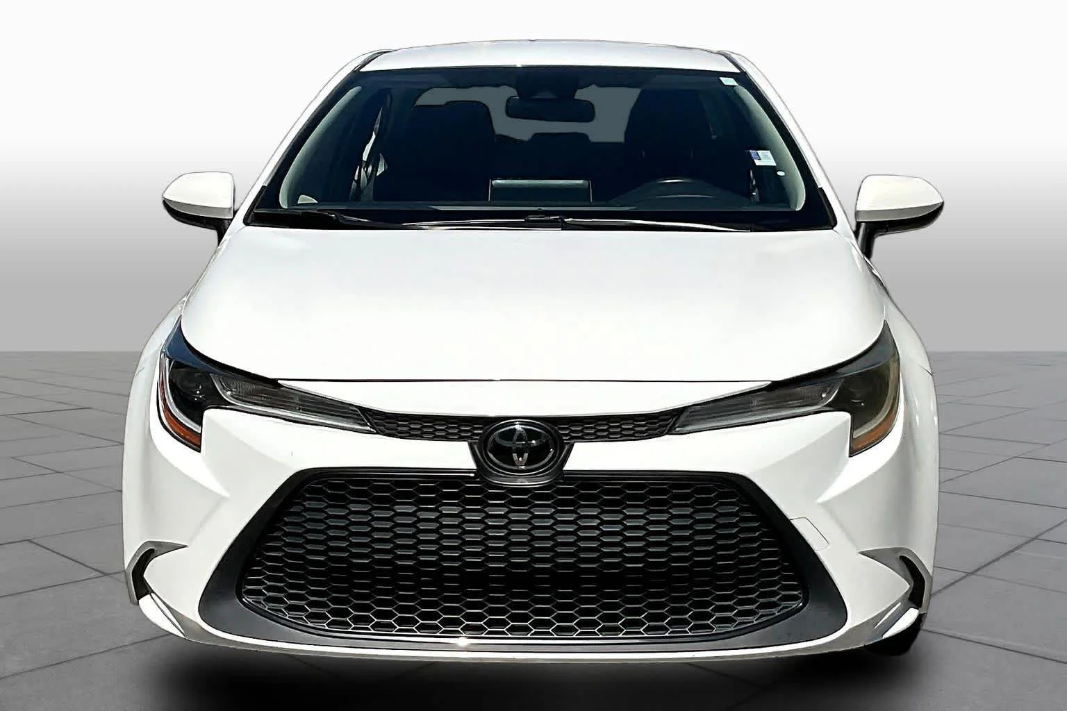 Used 2021 Super White Toyota LE image 4