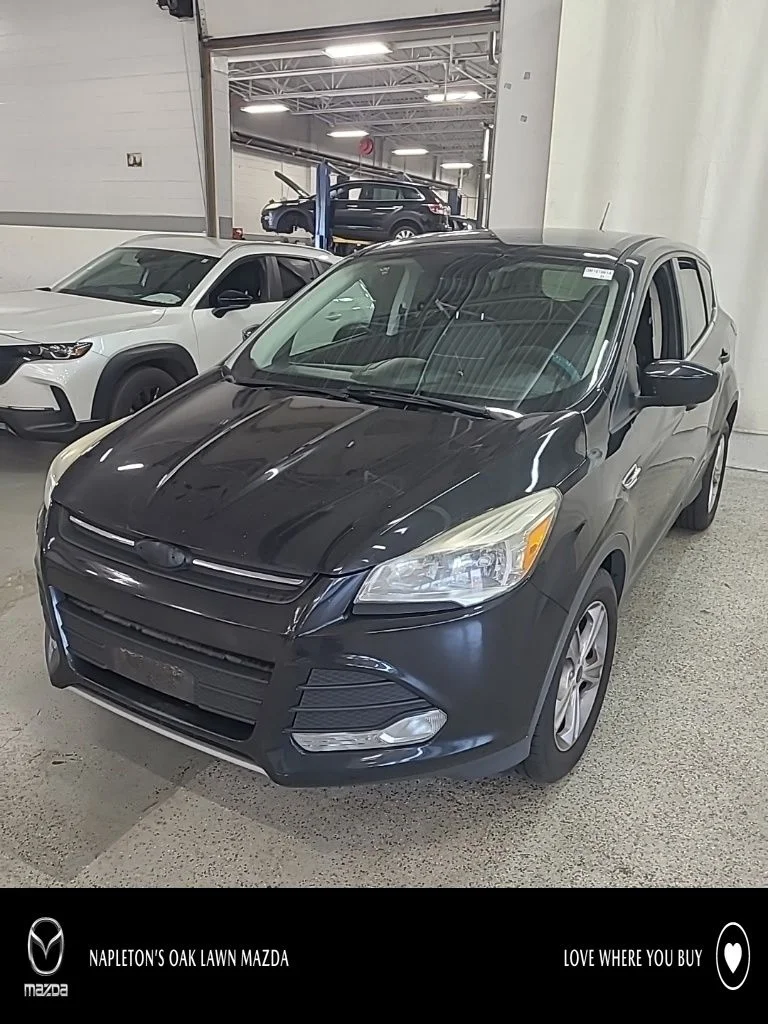 Used 2014 Black Ford SE image 1