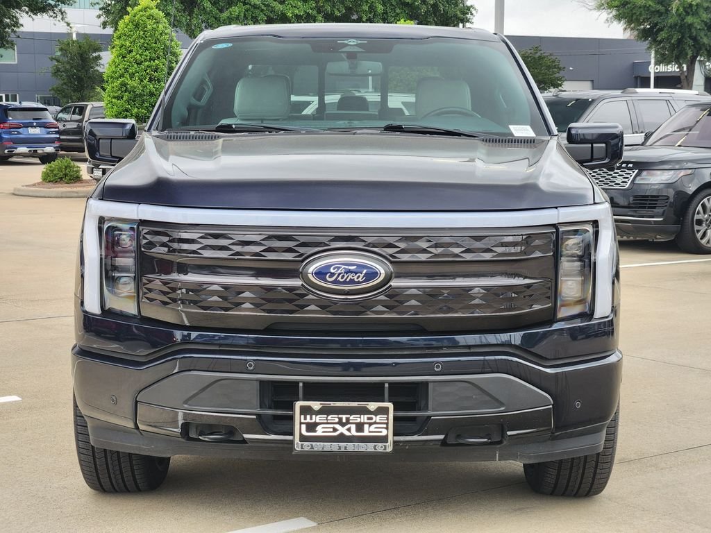 Used 2023 Ford F-150 Lightning Platinum with VIN 1FT6W1EV9PWG16452 for sale in Houston, TX
