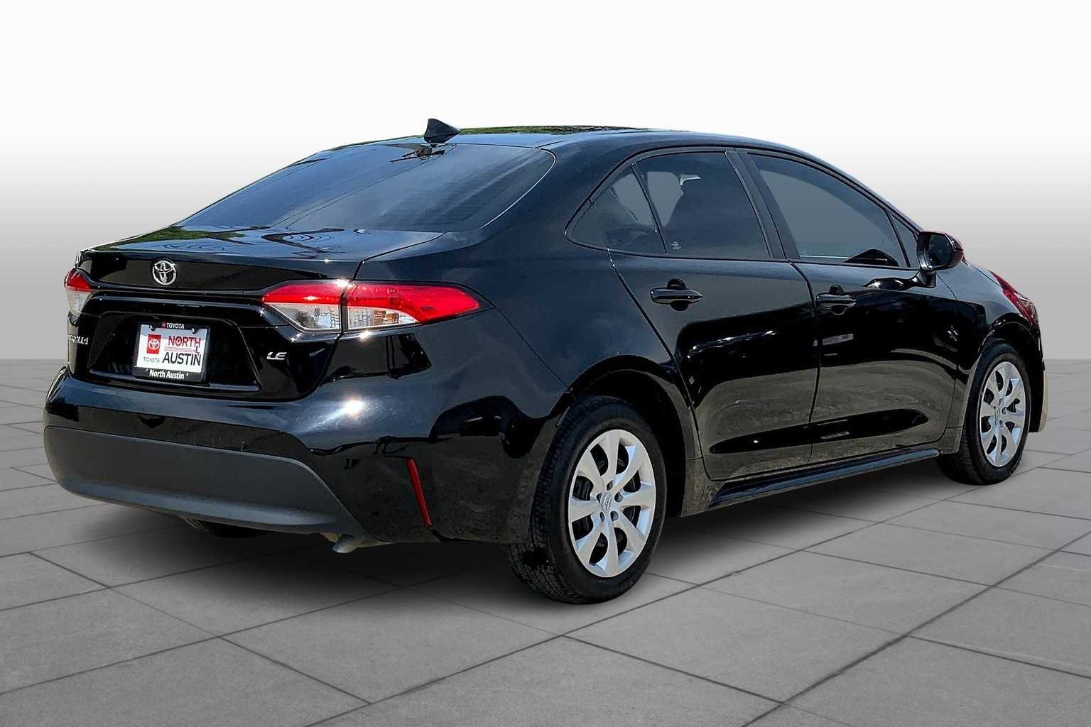 Used 2023 Midnight Black Metallic Toyota LE image 13