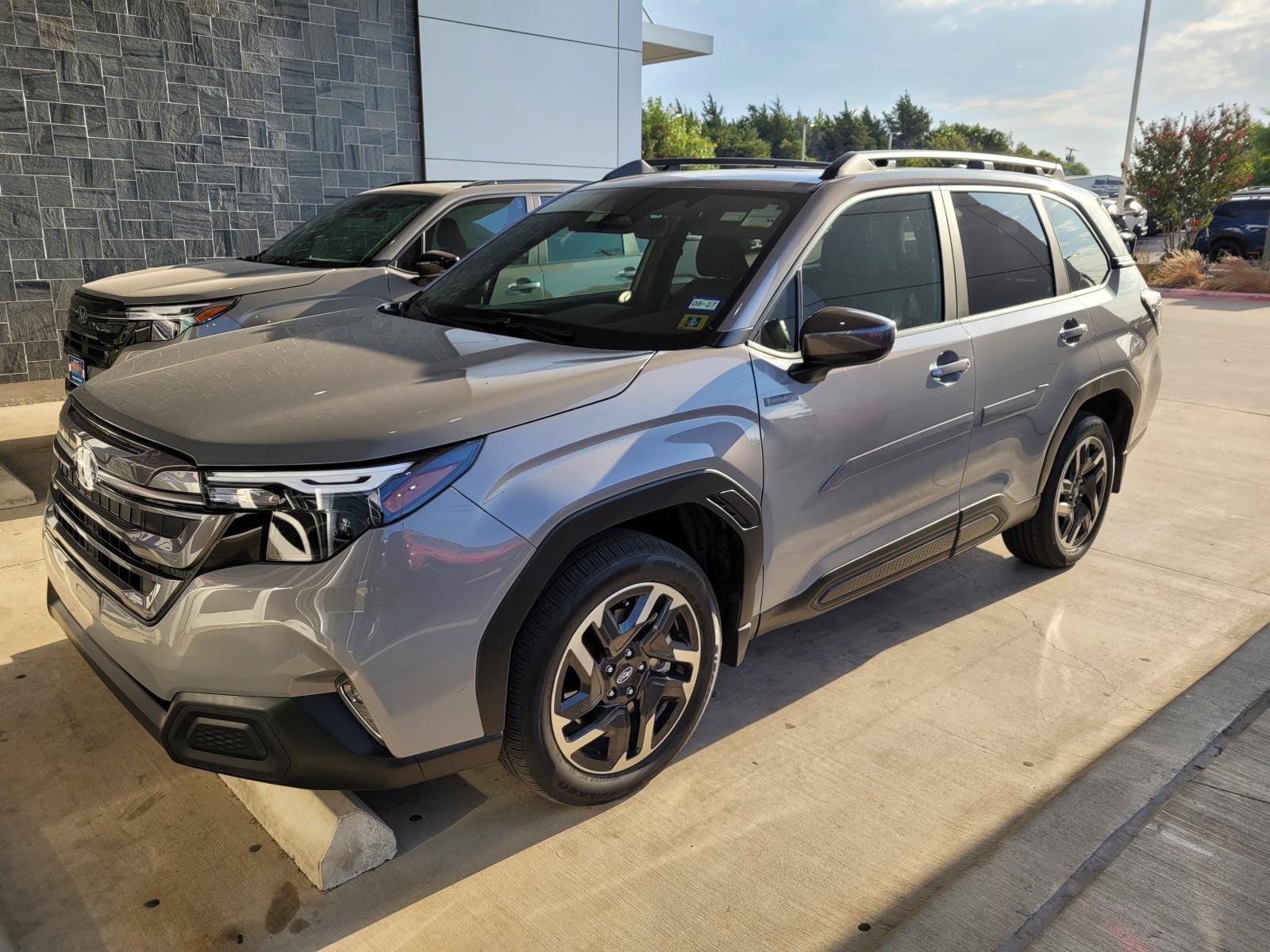 Used 2025 River Rock Pearl Subaru Premium Hybrid image 1