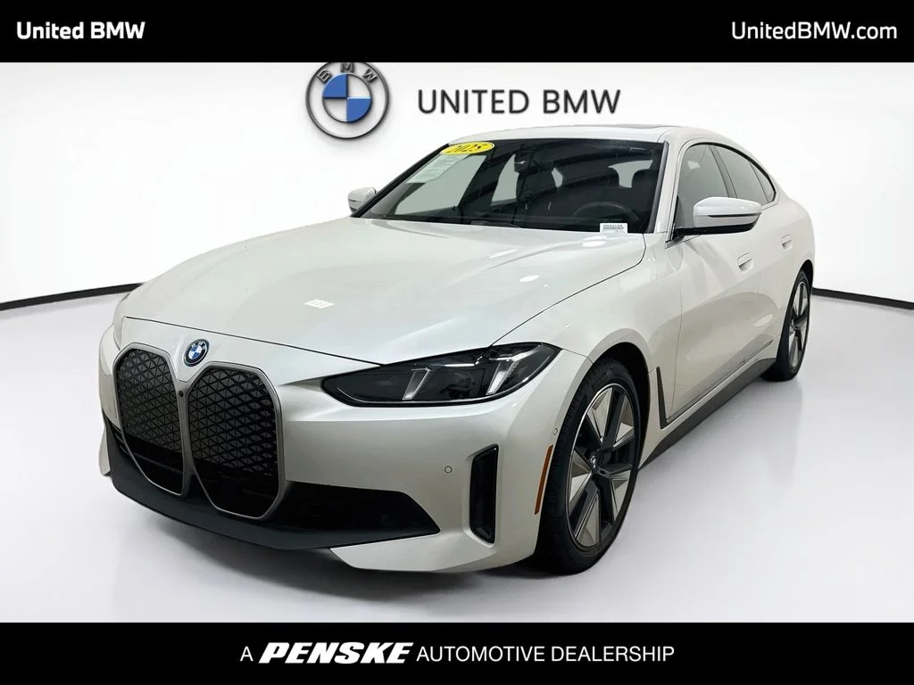 Certified Used 2025 Mineral White Metallic BMW eDrive40 image 1