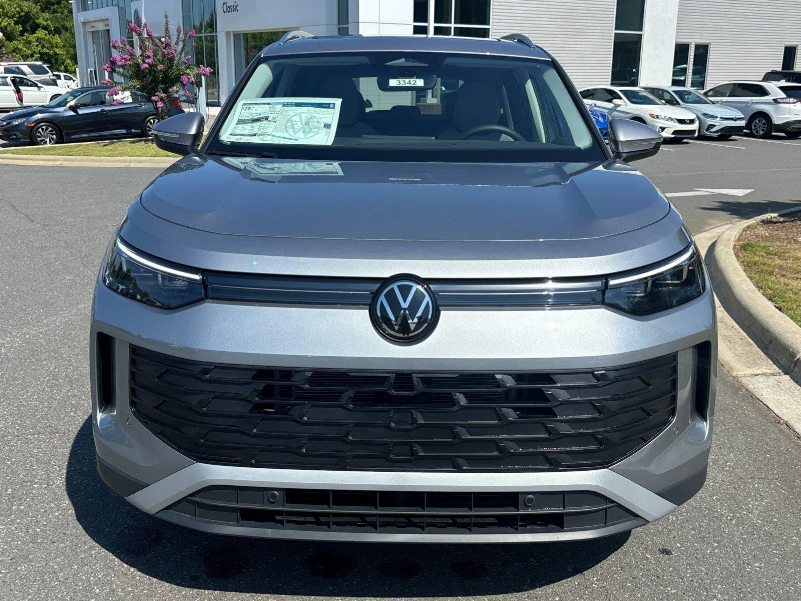 New 2026 pyrite silver metallic Volkswagen SE image 8