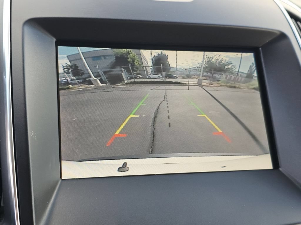 Used 2020 White Metallic Ford Titanium image 11