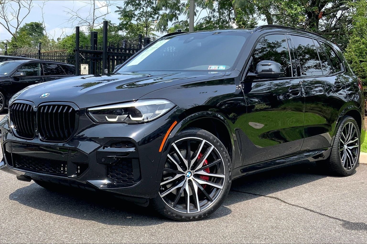 Used 2023 Black Sapphire Metallic BMW xDrive40i image 1