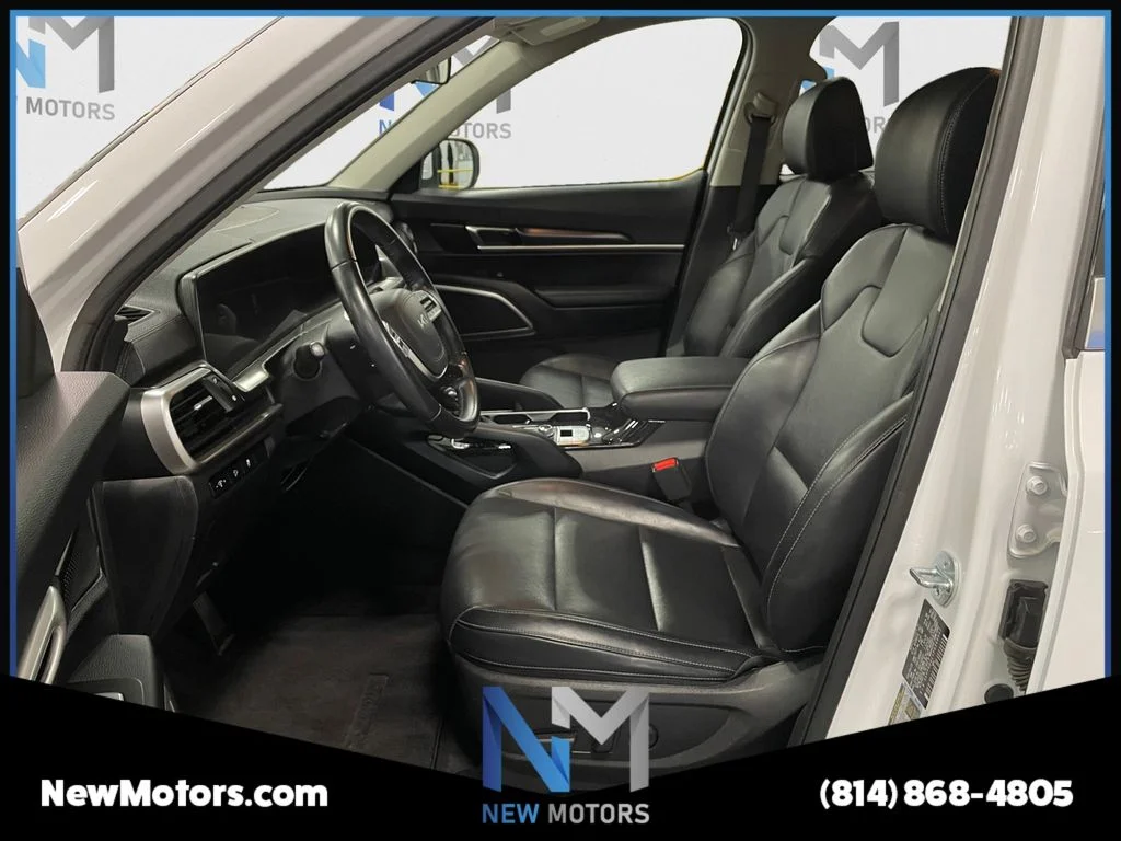 Used 2023 White Pearl Kia S image 9