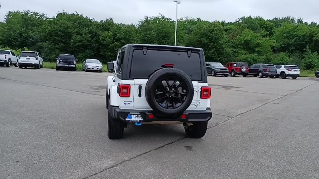 Used 2023 White Jeep Sahara 4xe image 7